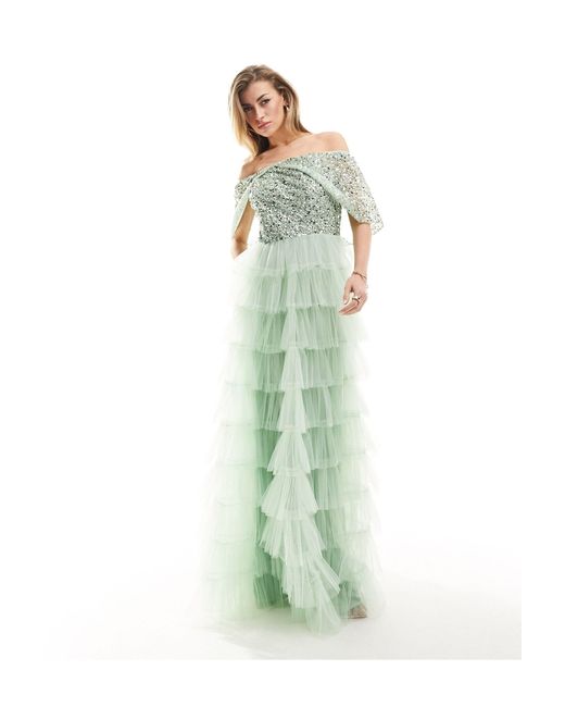 L'invitée - robe longue et ornementée à volants étagés et épaules dénudées - sauge Beauut en coloris Green