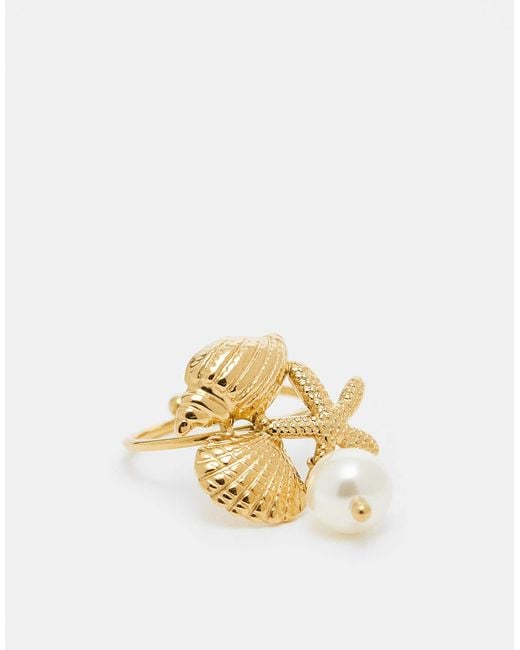 Kaiia Metallic – er, verstellbarer ring aus edelstahl mit muschelmix-design und perlendetail