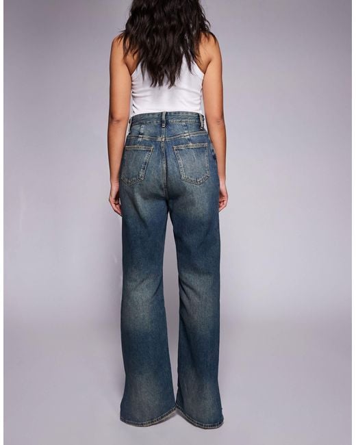 GOOD AMERICAN Blue The Khloé Patchwork Split Hem Jean