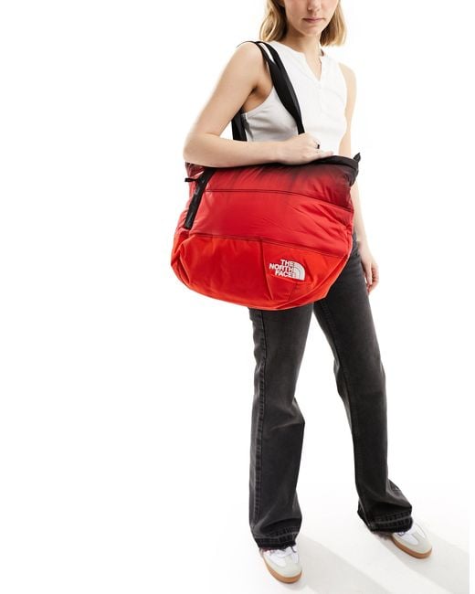 The North Face Red Nuptse Down Fill Puffer Tote Bag