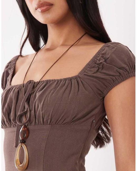 The Frolic Brown Exclusive Linen Feel Ruched Bust Cap Sleeve Mini Dress