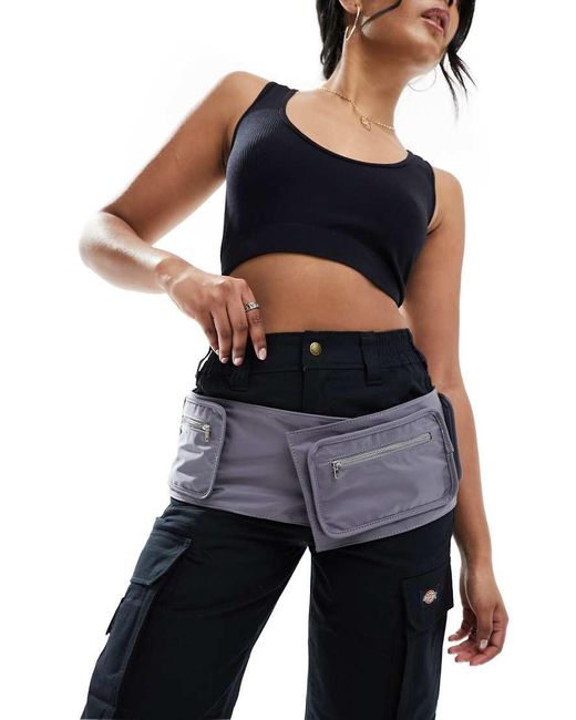 Rinonera Estilo Cinturon De Mango de color Negro Lyst