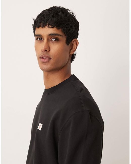 Calvin Klein Black Small Badge Logo Sweatshirt for men