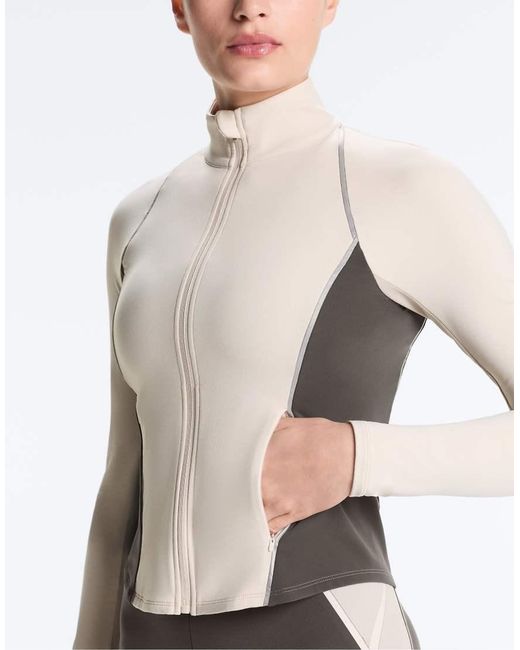 Oysho White Light Warm Reflective Technical Jacket