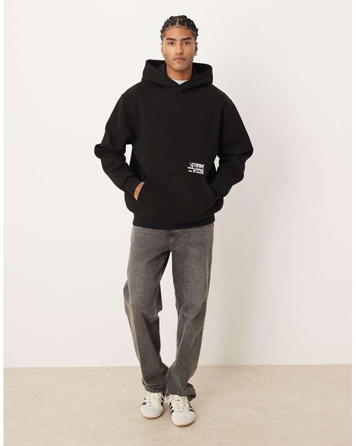 ASOS Ruimvallende Hoodie Met Tekstprint in het Black voor heren