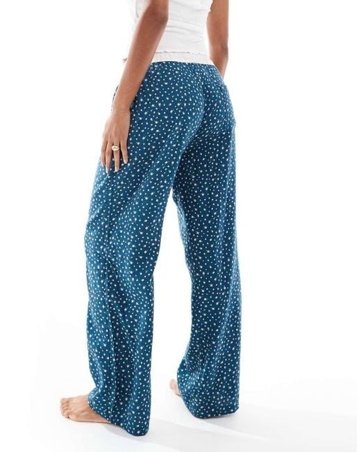 Pantalones De Pijama De Pernera Ancha Con Estampado De Florecitas De Franela De Cotton On-Azul Marino Cotton On de color Blue