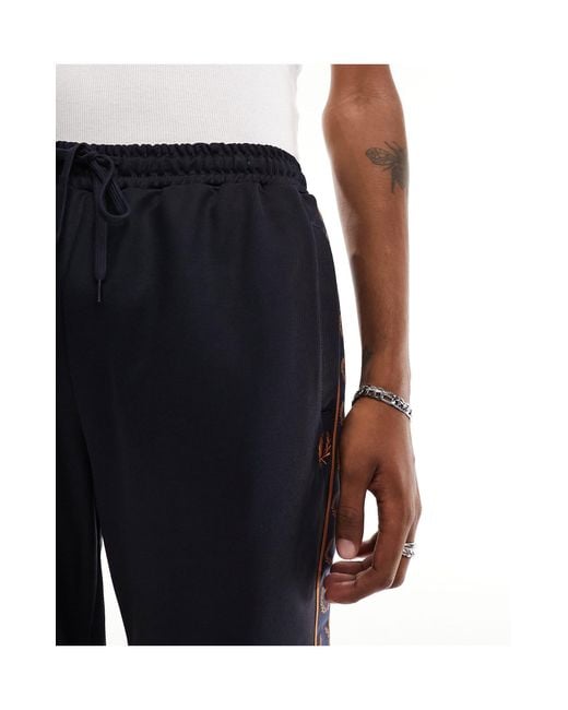 Fred Perry Black Taped Trackpants for men