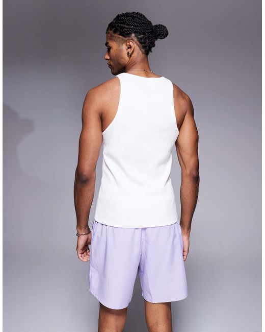Challenger - short 7 pouces en tissu dri-fit - lilas Nike pour homme en coloris Blue