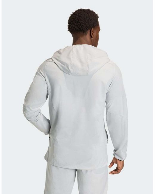 Adidas Originals White Tiro Travel Windbreaker Jacket for men