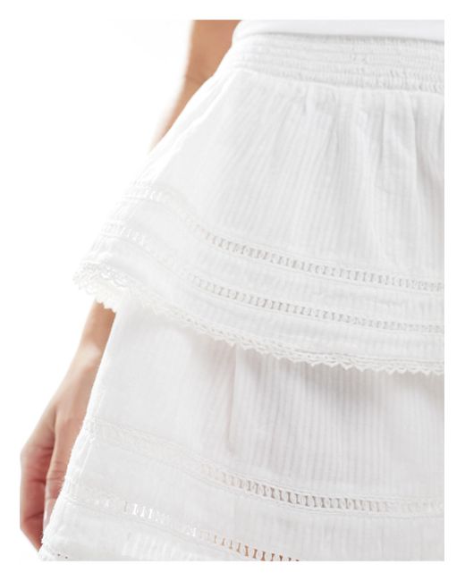 Cotton on - mini-jupe tendance folk avec volants étagés et bordures dentelle Cotton On en coloris White