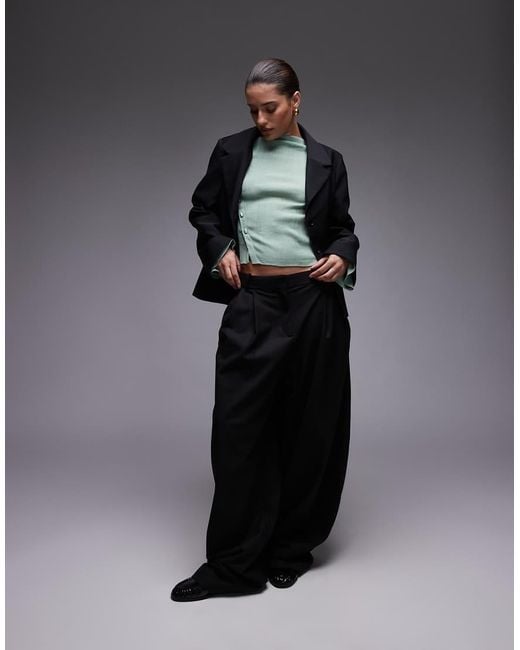 Top A Maniche Lunghe Verde Testurizzato Trasparente Con Bottoni Asimmetrici di & Other Stories in Gray
