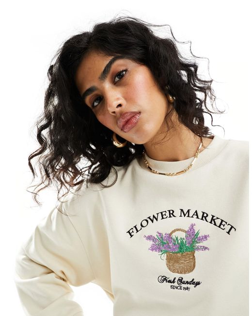 ASOS Black Oversized Sweatshirt With Embroidered Flower Market Graphic