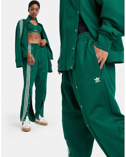 Adidas x - Pantaloni sportivi color verde scuro con bottoni a pressione di Ivy Park in Green