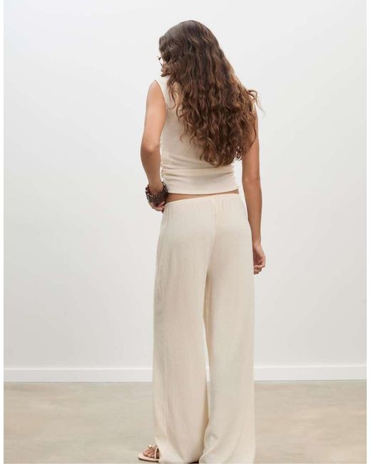 Stradivarius Natural Flowing Creased-effect Trousers