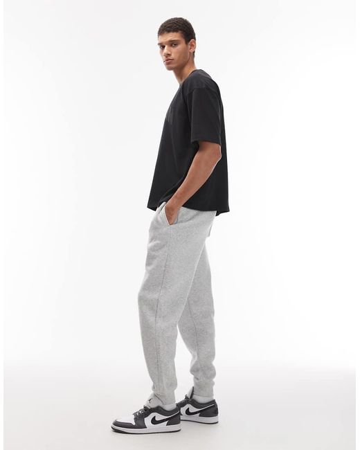 Joggers Grises Con Bajos Ajustados De Felpa De Nike de hombre de color Black