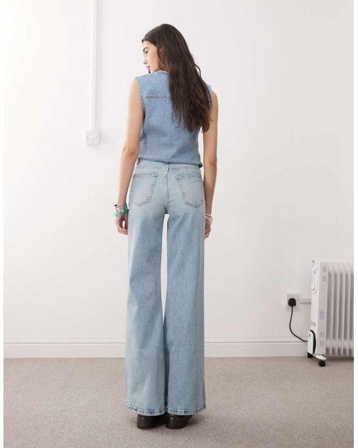 Reclaimed Vintage Blue Denim 70s Palazzo Jeans With Patch Pockets And Button Fly Detail