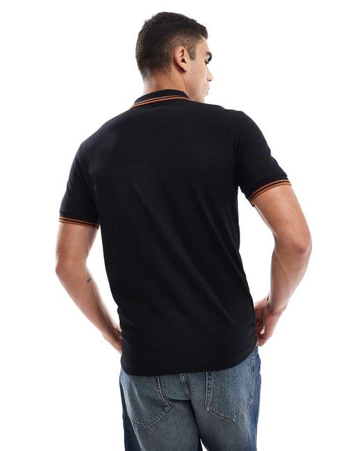 Polo Con Doppia Riga A Contrasto Sui Bordi Nera E Arancione di Fred Perry in Blue da Uomo