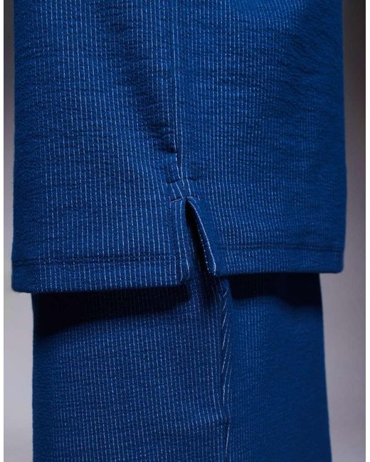 ADPT Blue Split Neck Texture Polo Shirt for men