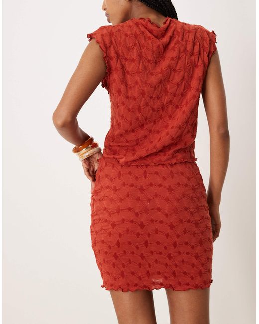 Mini-jupe texturée d'ensemble - profond Vila en coloris Red