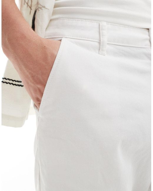Pantaloncini chino taglio classico slim elasticizzati bianchi di ASOS in White da Uomo