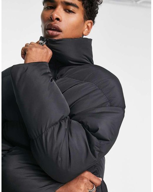 Chaqueta De Plumas Negra Acolchada De Collusion de hombre de color Black