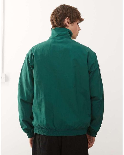 Adidas Originals Green Firebird Woven Track Top for men