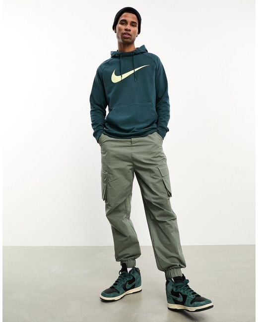 Sudadera verde oscuro intenso con capucha y logo swoosh dri-fit Nike de hombre de color Blue