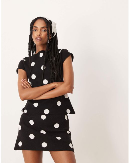 Mini-jupe d'ensemble à pois en maille douce ASOS en coloris Black