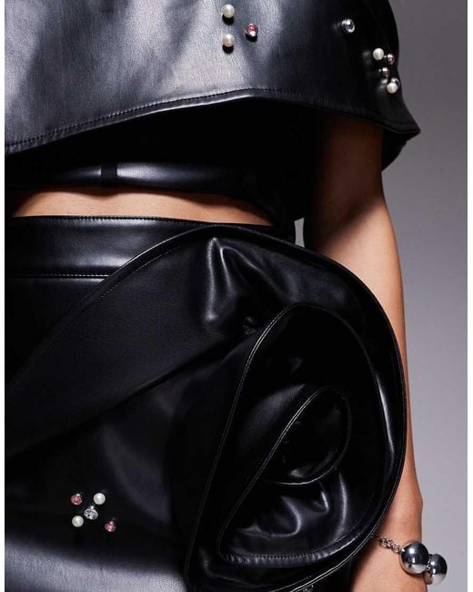 ASOS Black Pu Mini Skirt With Embellishment And Corsage