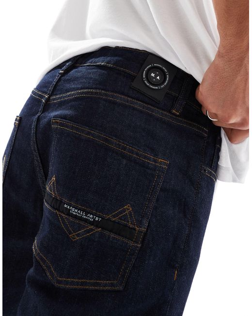 Marshall Artist – schmal geschnittene jeans mit rinse-waschung in Blue für Herren