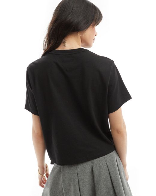T-shirt coupe carrée à écusson logo Tommy Hilfiger en coloris Black