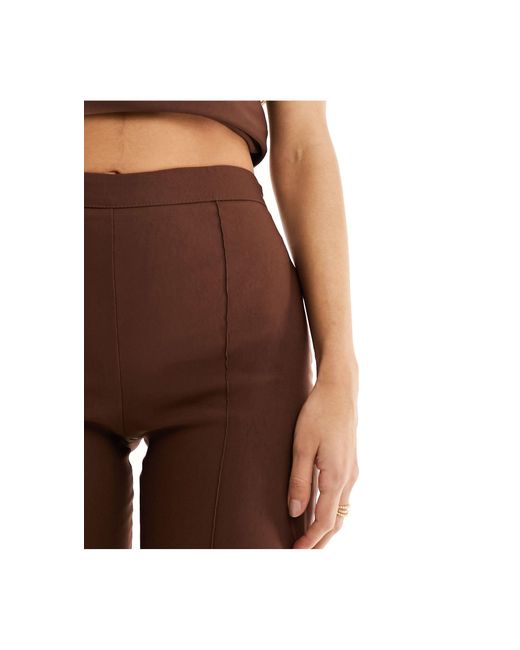 Pantaloni a zampa color cioccolato di Vesper in Brown