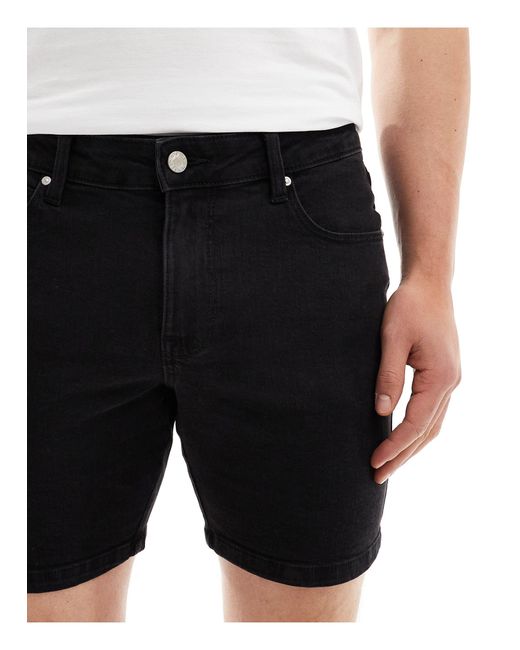 Pantaloncini di jeans skinny lunghezza media slavato di ASOS in Black da Uomo