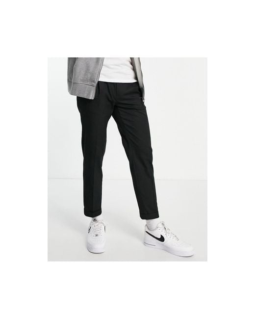 Cotton blend trousers with turnup hems  Massimo Dutti