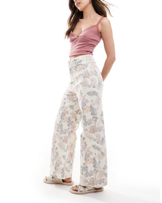 Jean large épuré coupe cheville avec poches devant - imprimé fleuri ASOS en coloris Multicolor