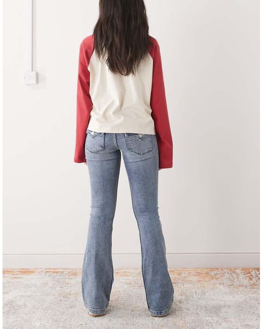 Monki Blue Pocket Detail Flared Jeans