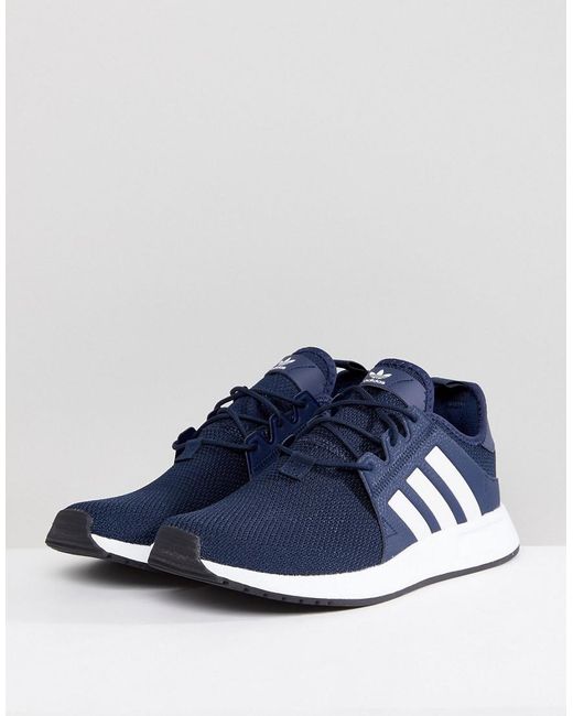 navy adidas trainers