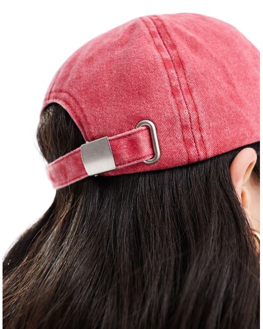 Cappello con visiera slavato di ASOS in Pink