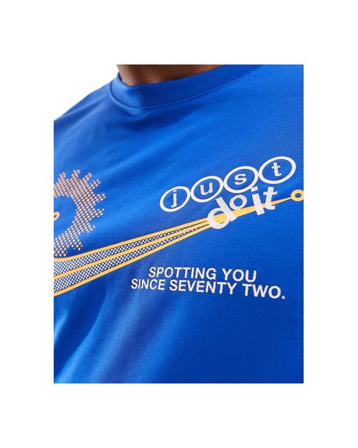 T-shirt à imprimé graphique - roi Nike pour homme en coloris Blue