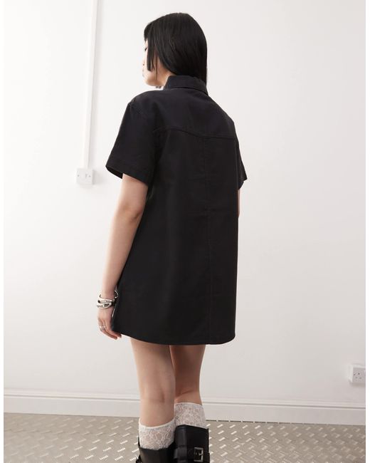 Robe chemise oversize en sergé - délavé Monki en coloris Black
