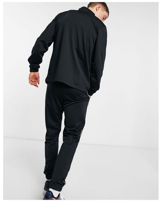 nike triple black tracksuit
