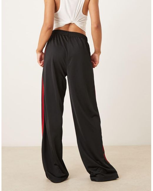 Pantalones De Chándal Negros Y Rojos Firebird Loose De Adidas Originals de color Blue