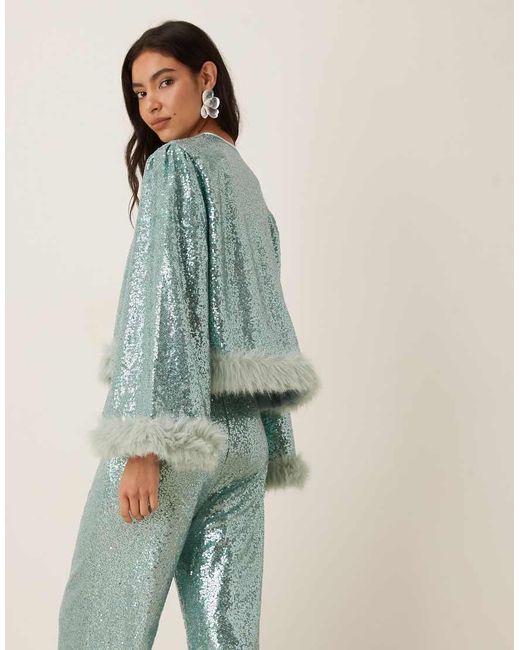 Sister Jane Blue Disco Darling Sequin Faux Fur Trim Bell Sleeve Top