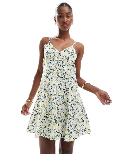 ONLY White – mini-trägerkleid mit gebundener rückseite und zitronenmuster
