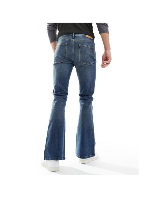 Jeans a zampa color lavaggio tinto di ASOS in Blue da Uomo