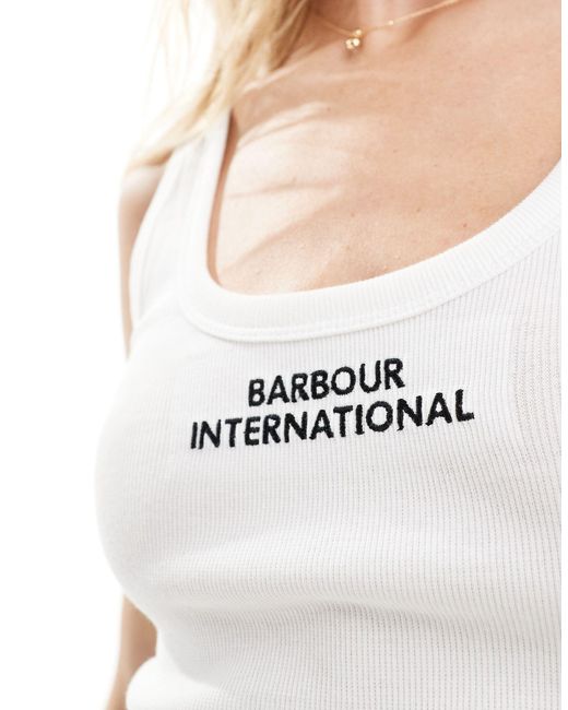 International - top senza maniche a coste con logo di Barbour in White
