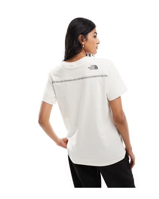 Zumu - t-shirt sporco con logo di The North Face in White