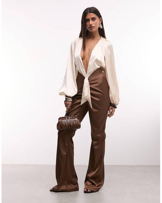 The Dolls House Natural Anthia Premium Satin Plunge Neck Balloon Sleeve Flared Jumpsuit