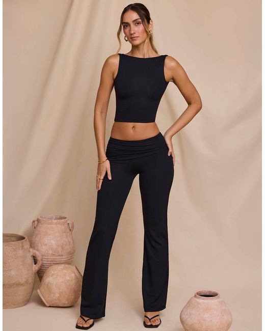 Oh Polly Natural Mid Waist Slinky Flare Trousers