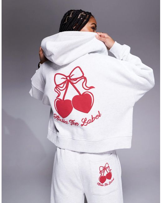 Studio - sweat à capuche zippé court d'ensemble en coton majoritaire à imprimé cerise au dos - chiné et rouge Kaiia en coloris Gray